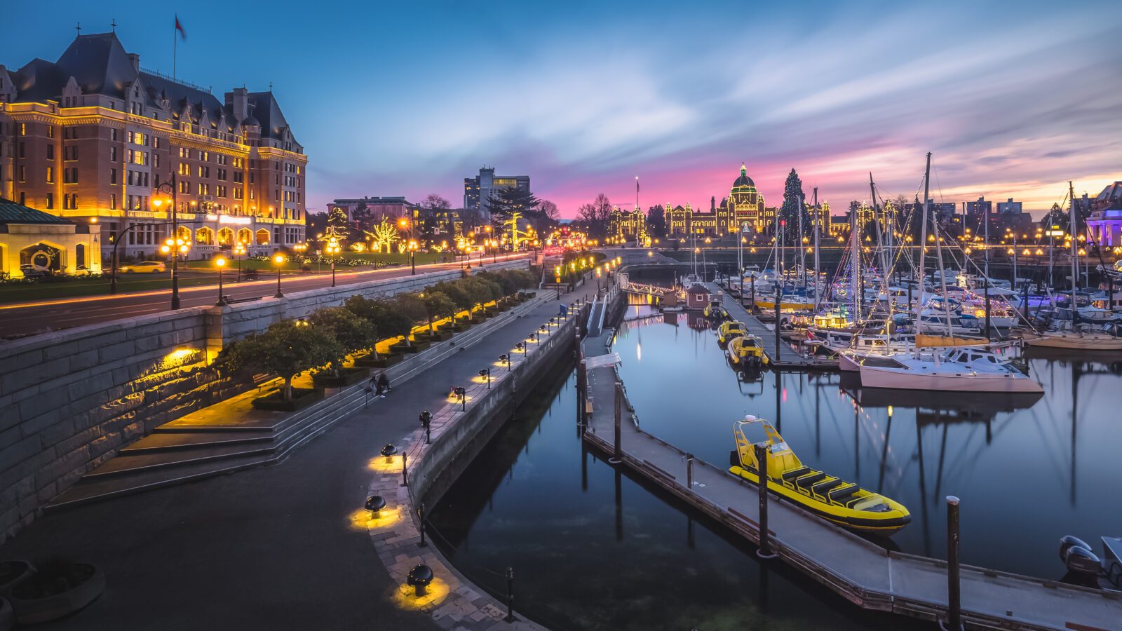 Sunset cityscape panoramic view of the Inner Harbour, the  and the Legislative Assembly of British Columbia in Victoria, B.C, Canada during Christmas Holidays.